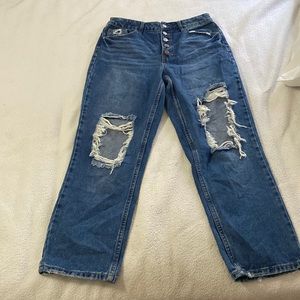 Dark blue women’s ripped jeans.
